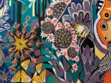 A brightly painted mural that displays a variety of desert plants, including cactuses, and animals including bats amongst swirls and patterns in different shades of reds, blues, and greens.