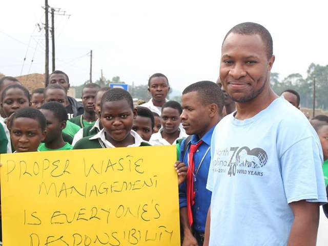 Bruce with Bigodi secondary school club on waste managment